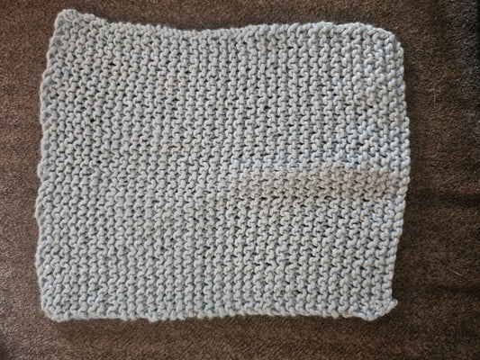Light blue hand knitted washcloth