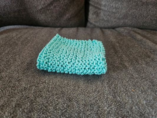 Light blue hand knitted washcloth
